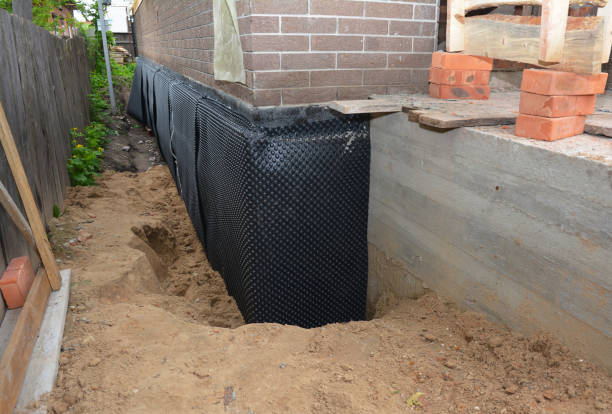 SJ Waterproofing Pros technician performing targeted Waterproofing assessment in Hunt Valley, MD